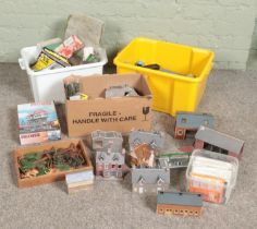 Three boxes of railway diorama accessories including a large quantity of buildings, miniatures