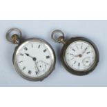 Two silver fob watches. The smaller example stamped 800 with continental marks, the other with