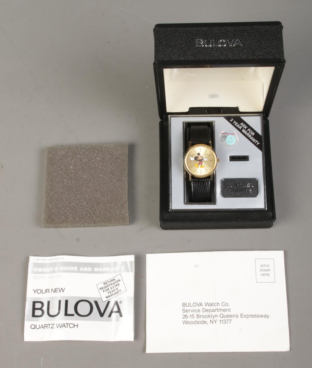 A boxed Bulova Mickey Mouse quartz wristwatch, on black 'Genuine Lizard' strap. With owner's guide - Image 3 of 4