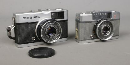 An Olympus Trip 35 camera, with f=40mm lens, lens cap and branded case, together with an Olympus