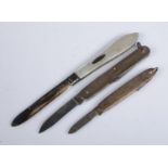 Three folding fruit knives, each bearing either silver blades or silver bodies. To include Walker