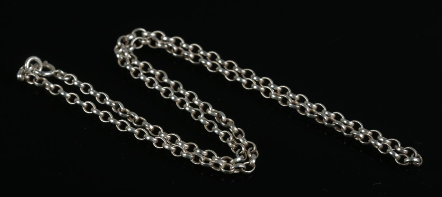 A silver 20 inch rolo-link chain, stamped 'sterling' to clasp. 11g.