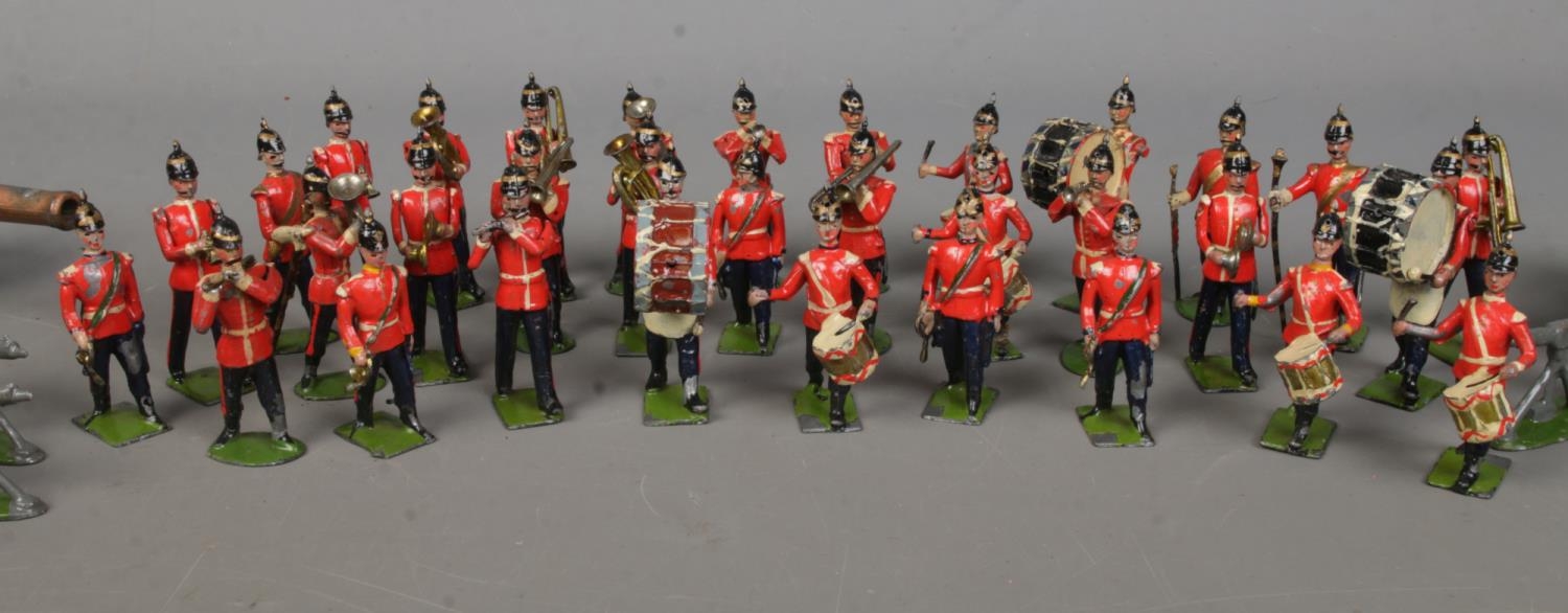 A collection of lead soldier figures, including Britains examples. Features marching band, cannons - Image 3 of 6