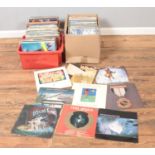 Three boxes of assorted vinyl records of mainly pop, rock and easy listening to include Dire