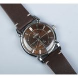A gents stainless steel Roamer manual wristwatch. With box and papers.