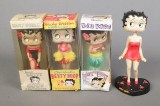 Four novelty Betty Boop bobble head figures to include three boxed Funko Wacky Wobblers: Hula Boop