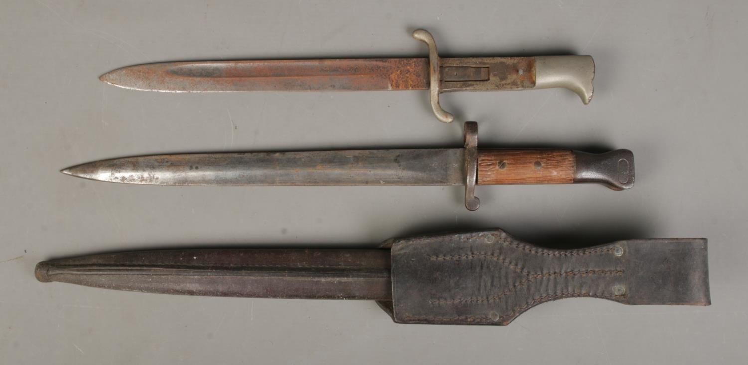 A German Fire/Police dress knife together with an 1888 pattern bayonet with scabbard. CANNOT POST - Image 2 of 2