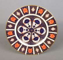 A Royal Crown Derby Imari 1128 pattern plate. Dated 1973. Approx. diameter 27cm.
