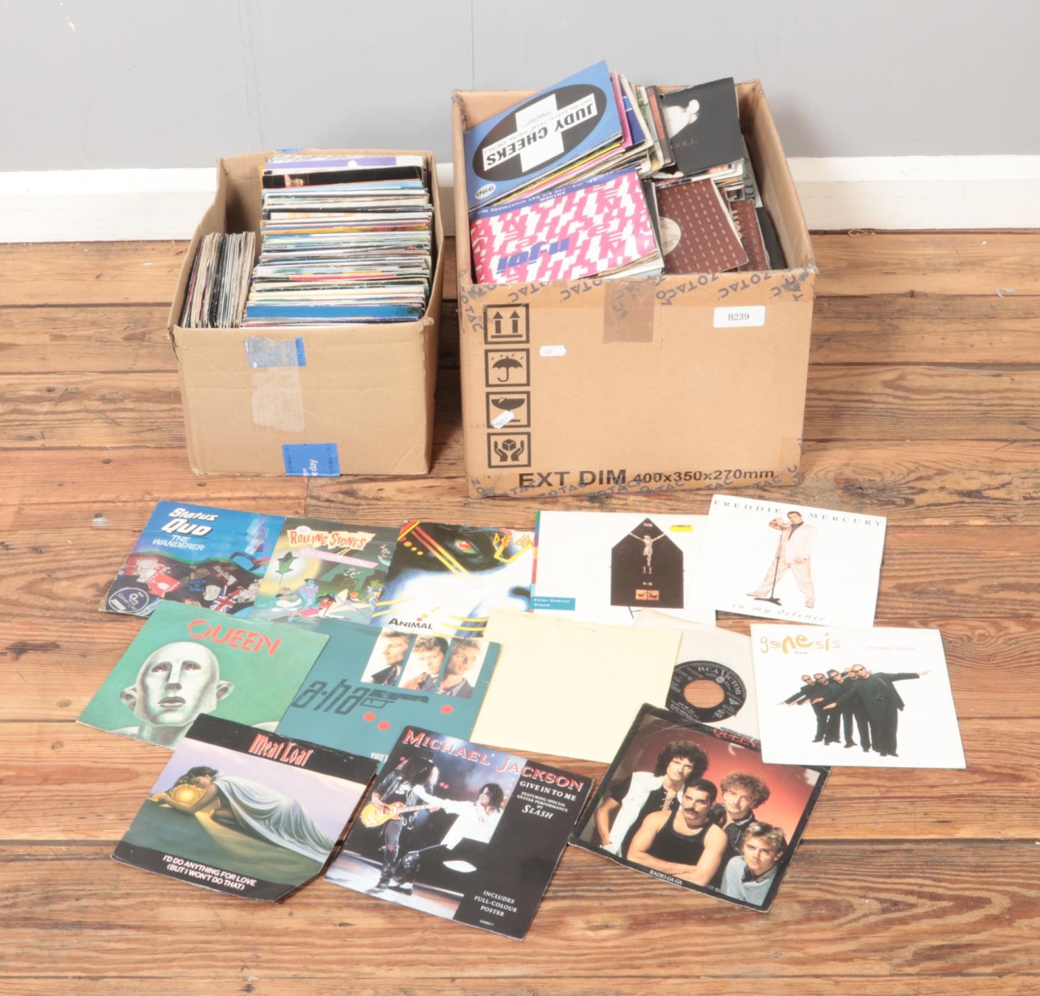 Two boxes of assorted vinyl singles of mainly pop and rock to include Elvis Presley, Peter