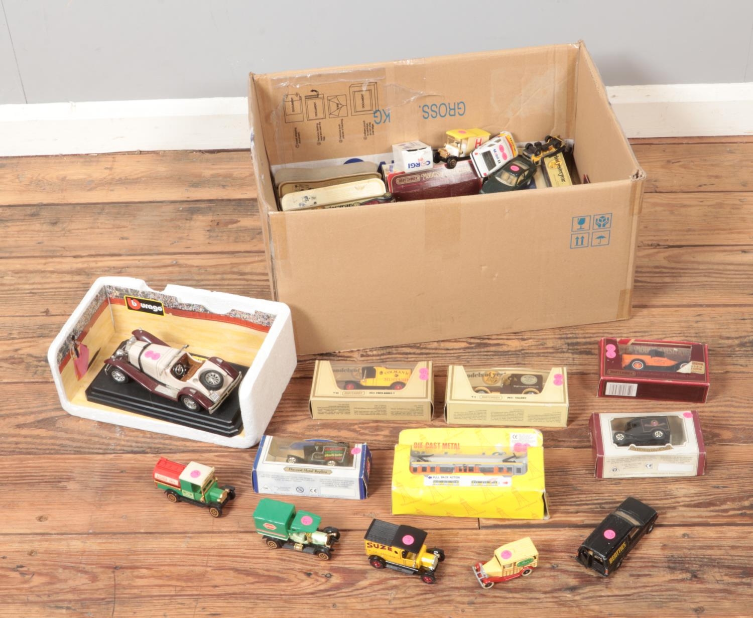 A box of assorted loose and boxed diecast vehicles to include Matchbox Models of Yesteryear, Lledo