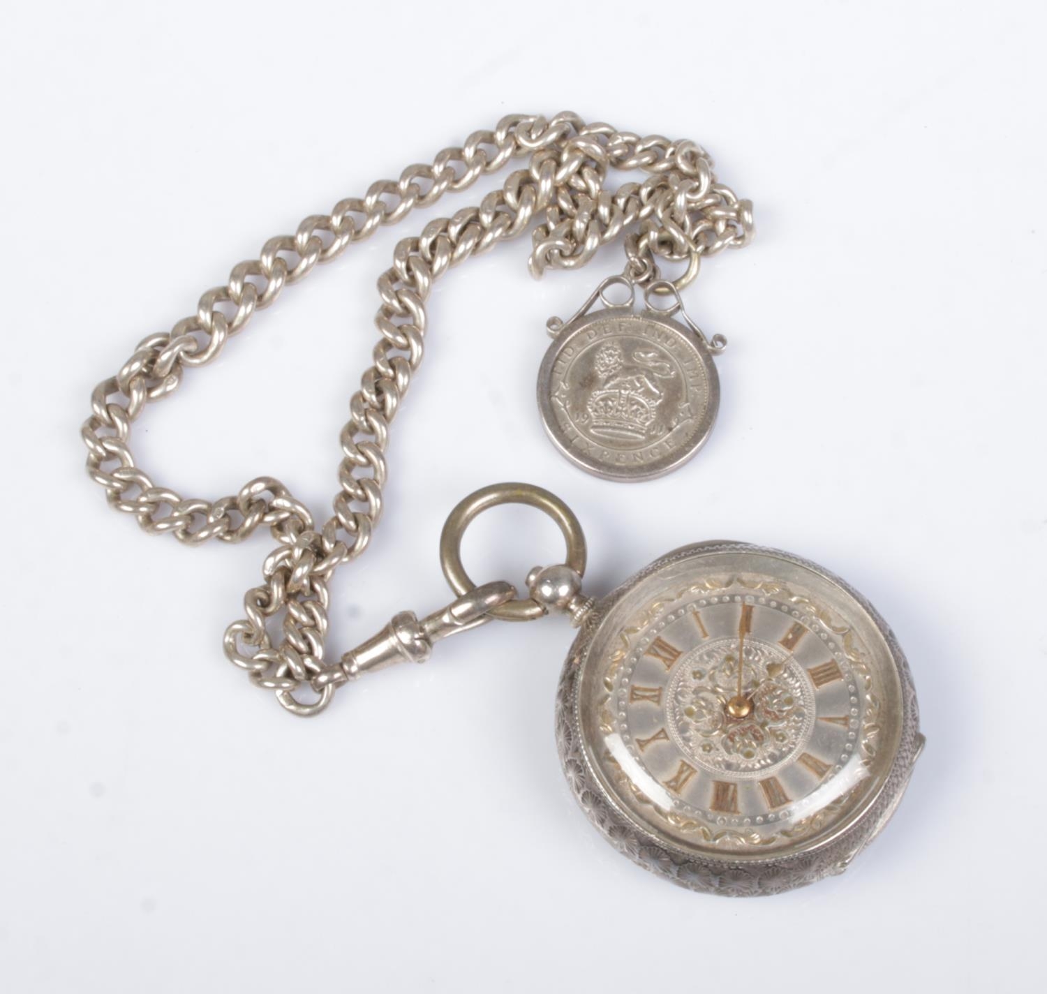 A continental silver fob watch. The case stamped for J Dowell & Co. With silver double albert