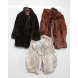 Two vintage fur coats along with a French simulated fur example.