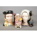 Three Royal Doulton character/toby jugs. Includes Catherine Parr (D6664), Anne Boleyn (D6644) and