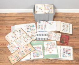 A box containing a good collection of mostly filled stamp albums, together with a small quantity