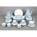 A collection of Denby dinner and tea wares to include coffee pot, plates, teacups, etc.