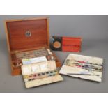 A collection of watercolour painting equipment, to include mahogany boxed Reeves & Sons