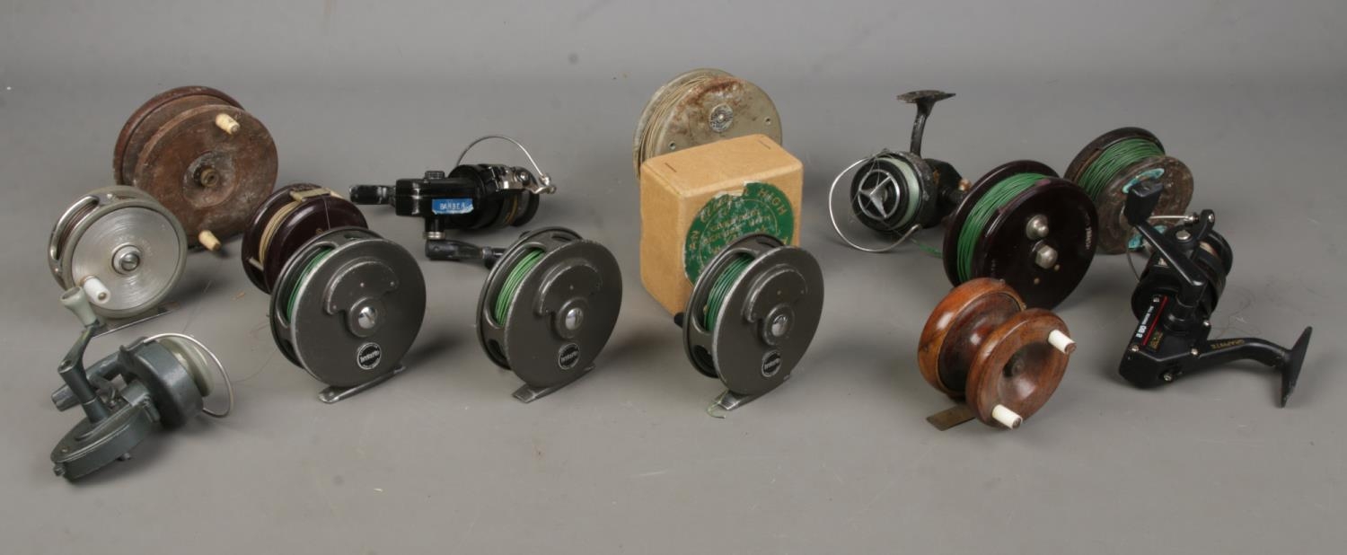 A large collection of vintage fishing reels, to include Intrepid De-Luxe, Ryobi GB2 and Sundridge
