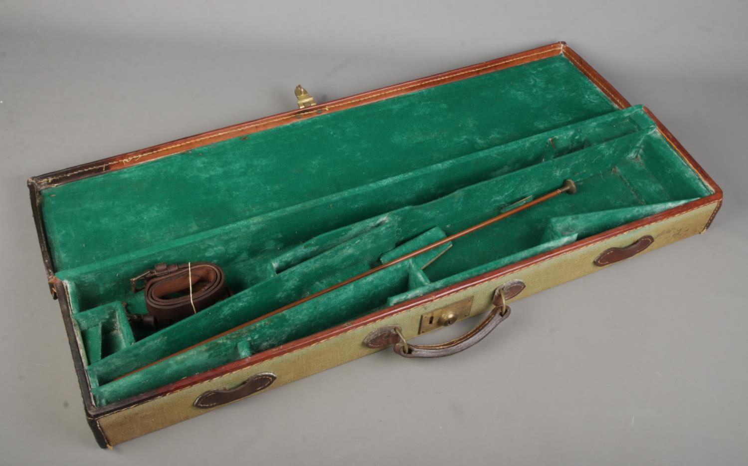 An antique green canvas and leather gun case. Bears label for John Rigby & Co. - Image 2 of 4
