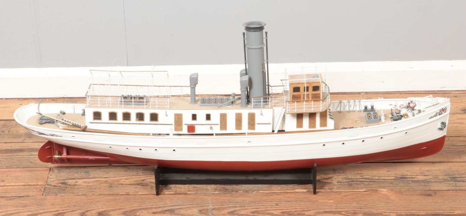 A large motorised model of the Schaarhorn steamship on display stand. Approx. length 112cm.