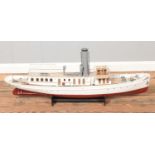 A large motorised model of the Schaarhorn steamship on display stand. Approx. length 112cm.