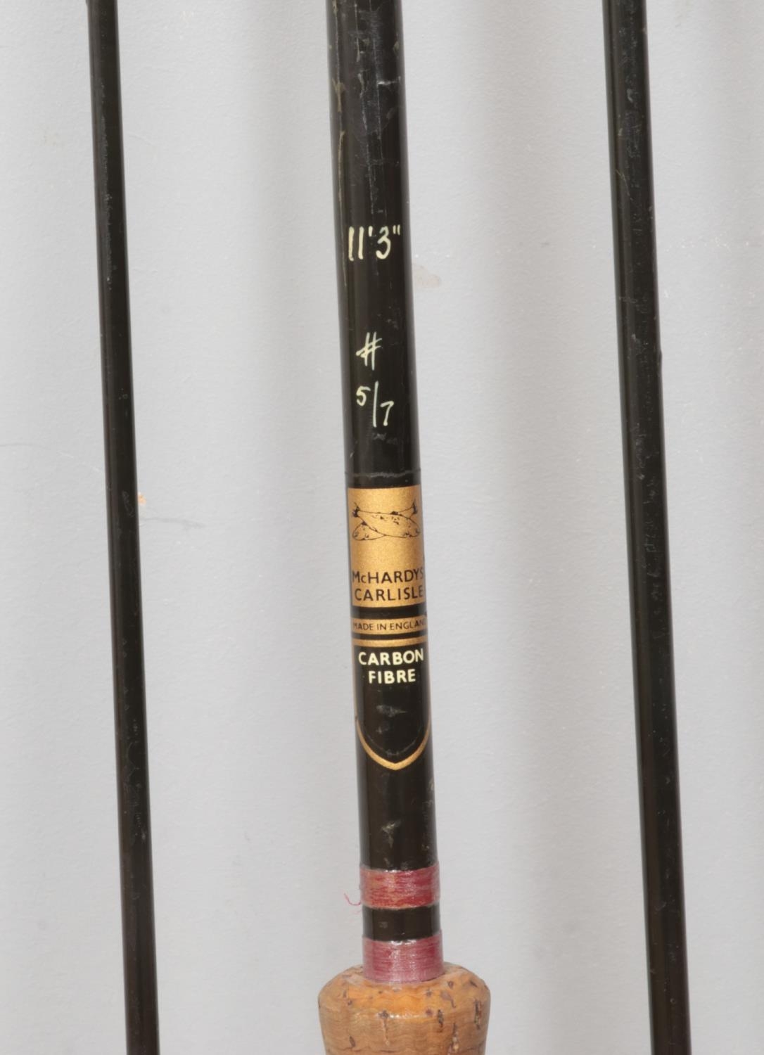 A McHardy carbon fibre three piece fishing rod in canvas bag. - Image 2 of 2