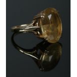 A 9ct Gold dress ring, set with large citrine coloured stone. Size N. Total weight: 5.7g.