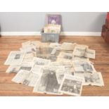 A collection of antique and vintage newspapers, spanning from the early 1900's to the 1950's, to