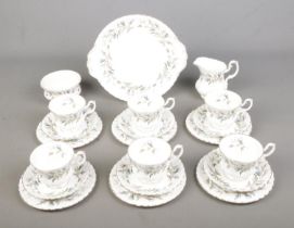 A Royal Albert part tea service in the Brigadoon pattern to include milk jug, sugar bowl, cake