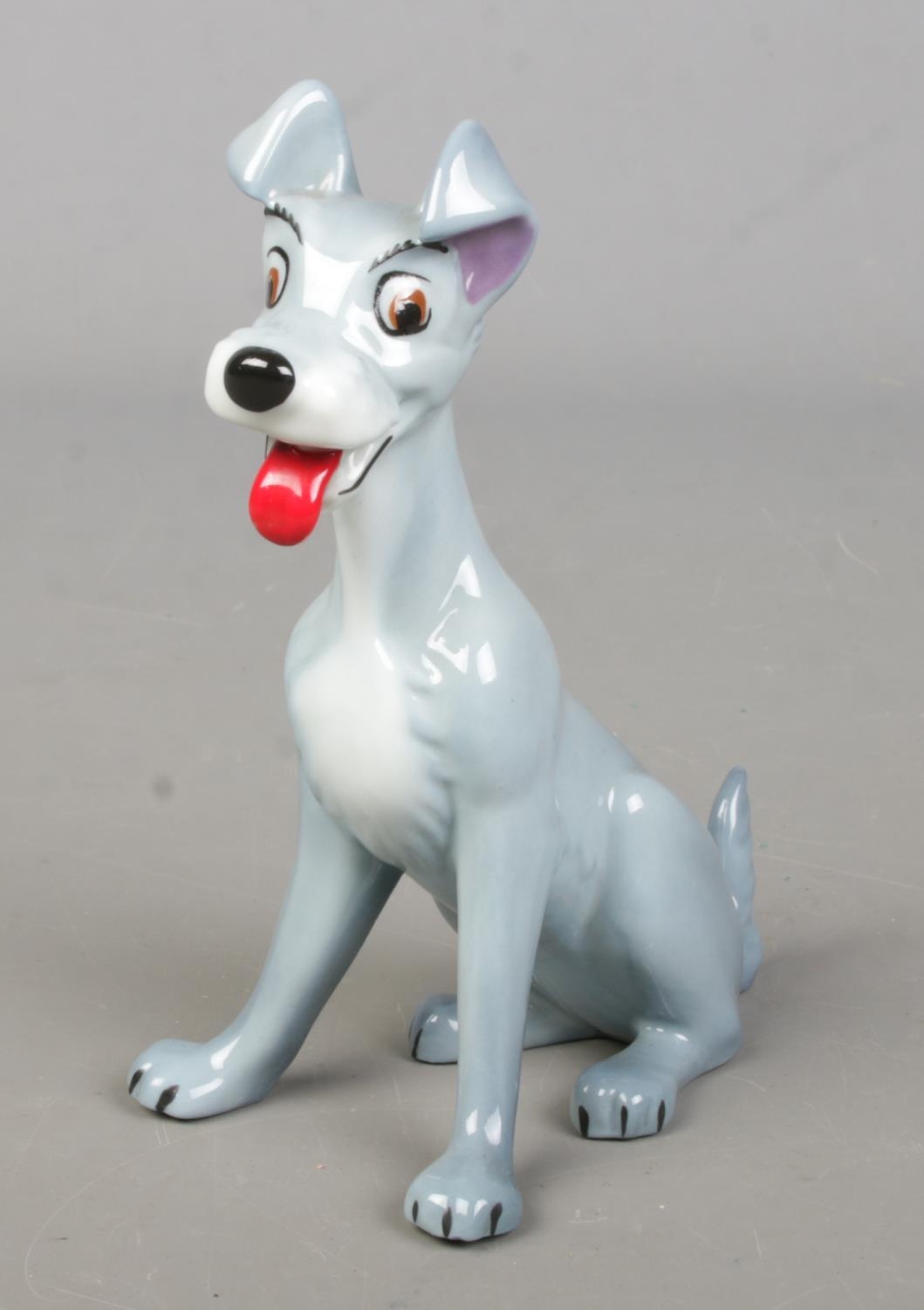 A Wade ceramic figure of Tramp from Disney's Lady & The Tramp. Height 14.5cm.