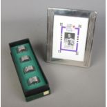 A collection of Charles Rennie Mackintosh pewter to include floral photo frame and boxed set of four