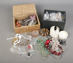 Two boxes of assorted costume jewellery to include large collection of beaded necklaces, earrings,
