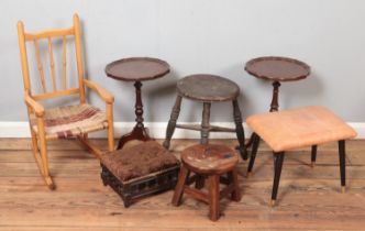 A quantity of small furniture including a milking stool, two wine tables, footstools and child