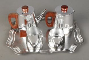 A Sona Art Deco style silver plated tea service along with similar plated tray.