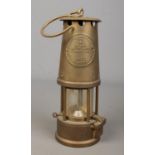 An Eccles Type 6 miners lamp by The Protector Lamp & Lighting Co Ltd.