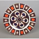 A Royal Crown Derby Imari 1128 pattern plate. Dated 1990. Approx. diameter 27cm.