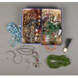 A collection of assorted costume jewellery to include single broken silver chain, Raymond Weil