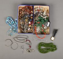 A collection of assorted costume jewellery to include single broken silver chain, Raymond Weil