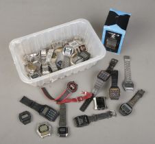 A box of digital wristwatches. Includes boxed Casio Club G, Citron, Omac etc. Some for repair.