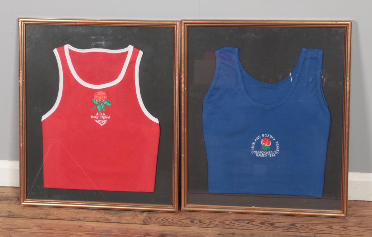 Two framed Boxing vests/shirts to include Amateur Boxing Association and England Boxing Team
