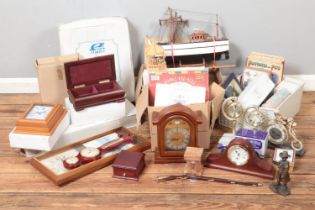 A quantity of mixed collectables including a model boat, modern tinplate toys, children's annuals