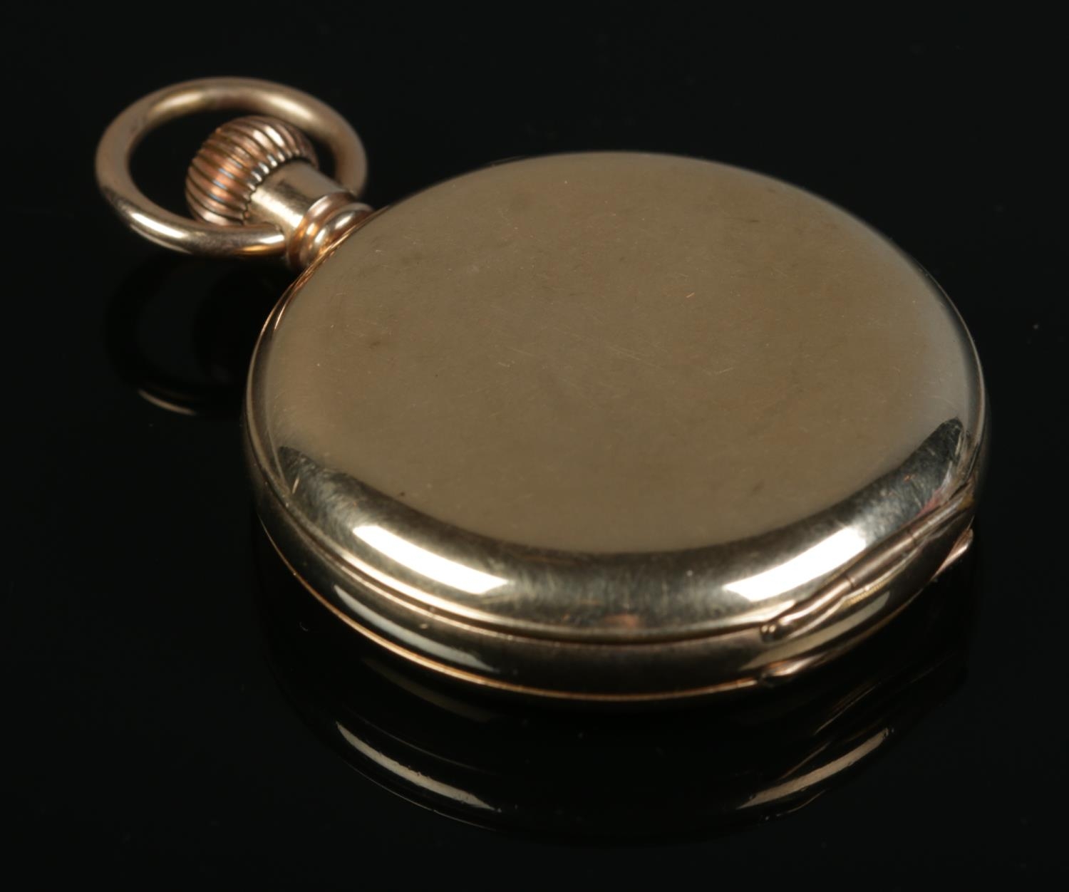 A gold plated open face pocket watch, with Roman Numeral face and subsidiary second dial. The 19 - Image 3 of 3
