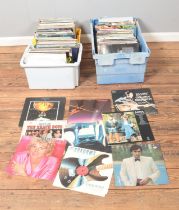 Three boxes of assorted vinyl records of mainly pop, rock and easy listening to include ABBA,