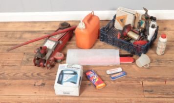 A collection of auto tools, spares and repairs to include battery charge, Draper jack, exhaust