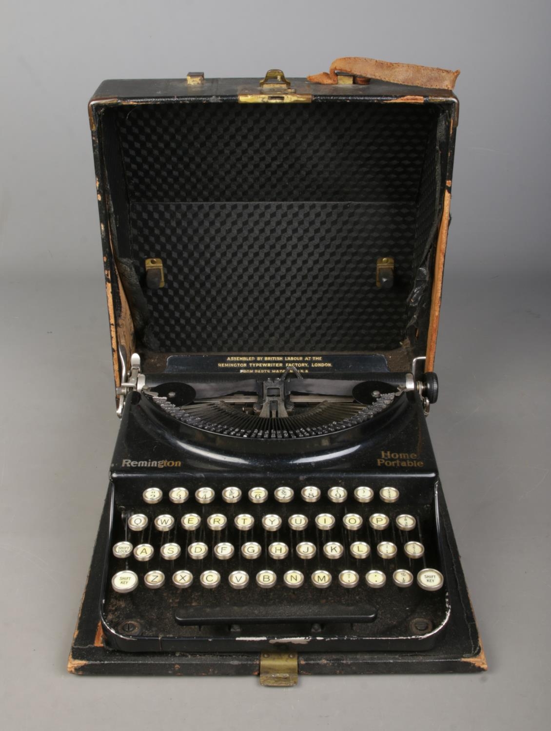 A Remington Home Portable Typewriter. Has inscription of ' Assembled by British Labour at the