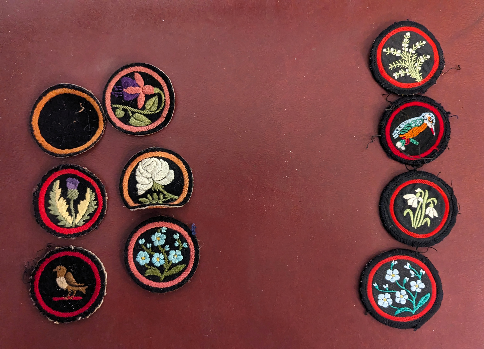 A vintage girl guides poncho, with a large collection of badges and two berets. - Image 5 of 5