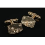 A pair of 9ct gold cufflinks. With engraved decoration and each set with a diamond chip. 6g.