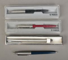 Four Parker pens; including fountain pen and three cased examples.