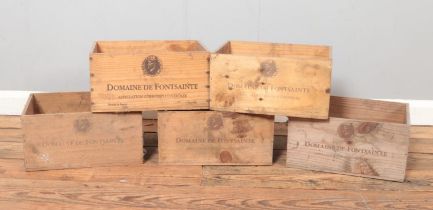 Five vintage wine crates; all stamped for Domaine de Fontsainte, product of France.