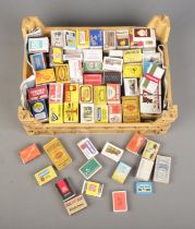 A large collection of vintage cigarette tins/boxes and matchboxes to include players, Draya, 1984