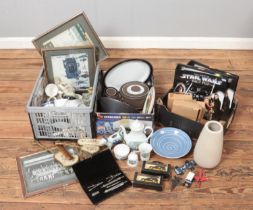 Three boxes of miscellaneous. Includes Lowry prints, embroided dressing table items, boxed diecast